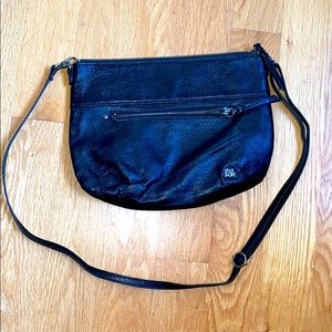 the Sak black leather cross body purse